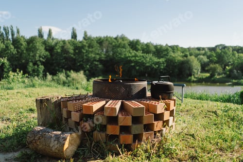 Preview: Summer Barbecue With Smoke and Kettle by a River