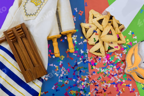 Preview: Purim is a Jewish holiday that is celebrated with hamantaschen cookies, a tallit, carnival masks