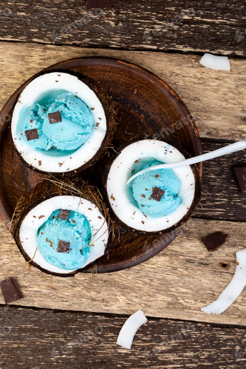 Preview: Blue ice cream in coconut bowl.
