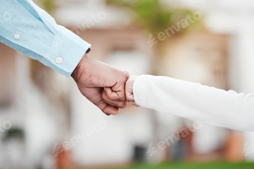 Preview: Adult, child and hands in fist bump for trust, agreement or partnership in generations against a bl