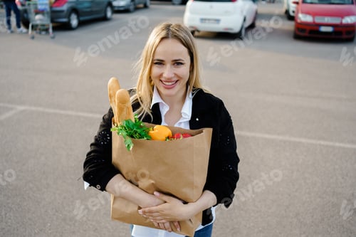 Preview: Women enjoying the fresh air outside the grocery store, each holding a paper bag filled with