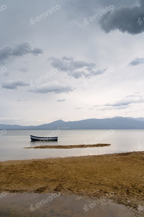Preview: lonely boat on lake Prespa North Macedonia