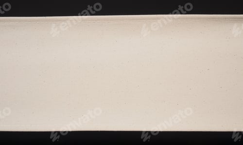 Preview: Ivory canvas or nylon texture for background on black background.