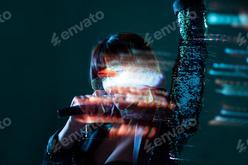 Preview: Stylish woman singing on stage
