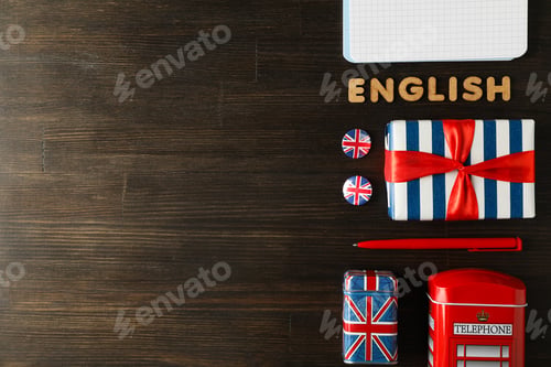Preview: The concept of learning English, a notebook on a blue background.