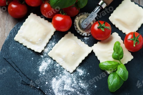 Preview: Uncooked ravioli with tomato and basil