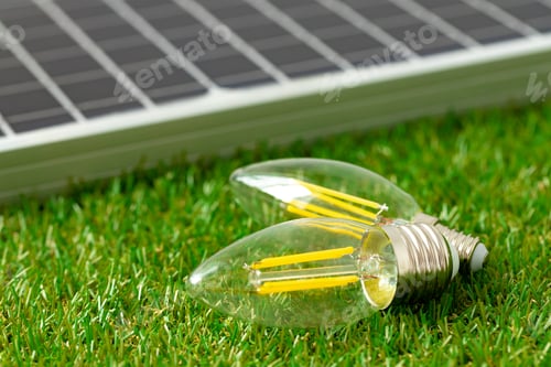 Preview: Solar energy panel and light bulb, green energy