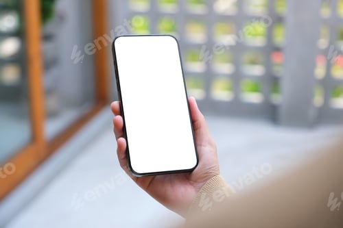 Preview: Mockup image of a woman holding mobile phone with blank desktop white screen