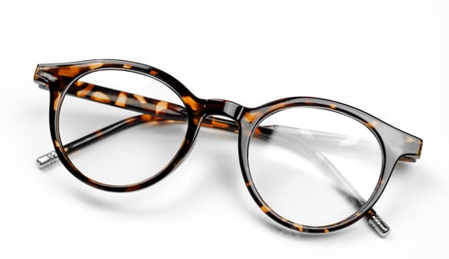 Preview: Stylish leopard-colored eyeglasses on a white background