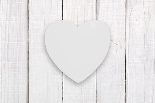 Preview: Blank white wooden heart on white wooden background