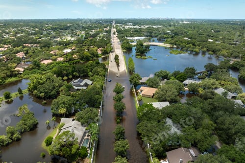 Preview: Hurricane rainfall flooded road. Drowned car on city street in Florida residential area.