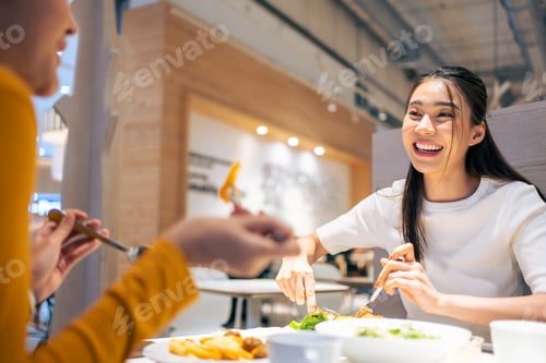 Preview: Asian beautiful women having dinner with friend in restaurant together.