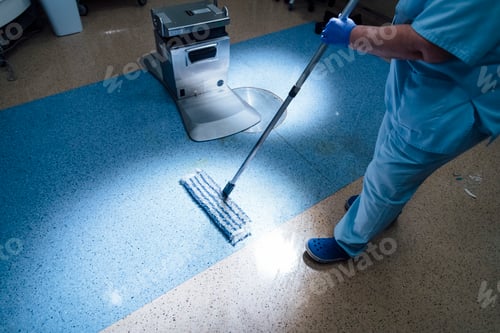 Preview: Concept photo of A hospital worker doing cleaning in operation room