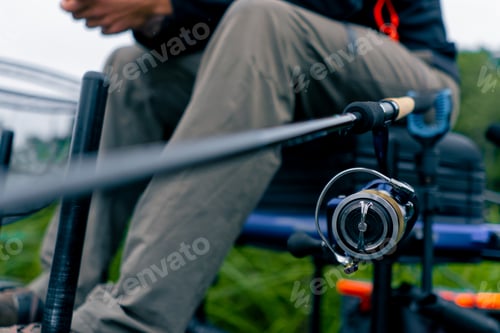 Preview: close-up Fishing tackle fishing spinning hooks and baits fisherman on reservoir feeder free style
