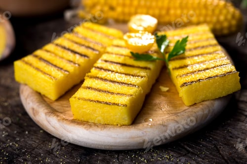 Preview: Grilled polenta on old wooden background