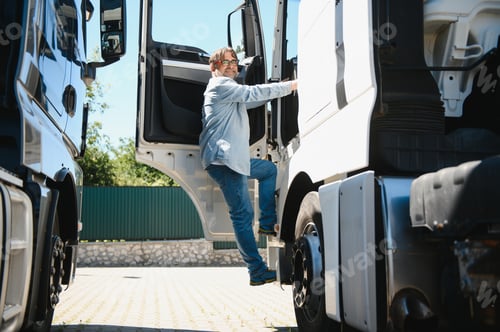 Preview: Senior man walking in front of his truck