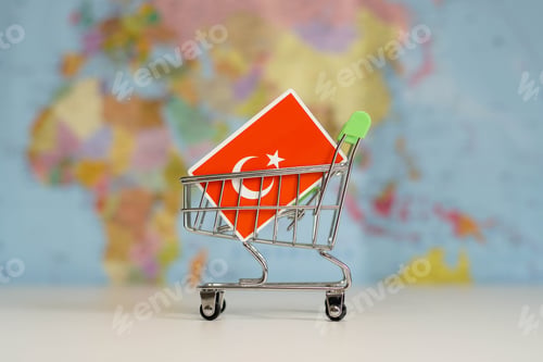 Preview: Turkish national flag in miniature shopping trolley cart. Shopping online or shipping, duty concept.