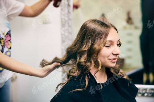 Preview: Female Enjoying Hair Styling At A Professional Salon