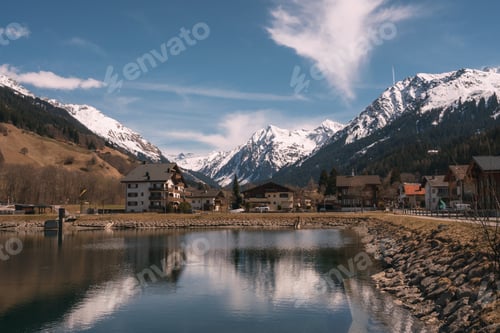 Preview: A mountain range with a small town in the valley