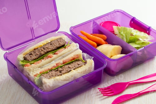 Preview: Healthy lunch box with sandwich, fresh vegetables and fruits