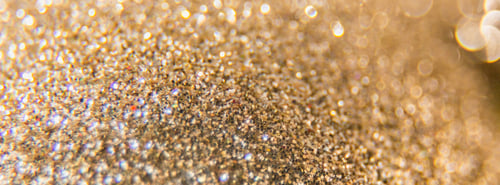 Preview: Horizontal long banner for web design with copy space of golden fir bauble with glitter closeup