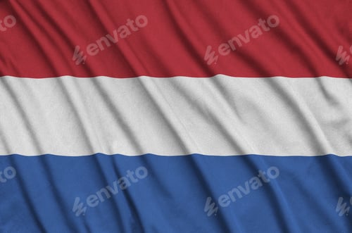 Preview: Netherlands flag is depicted on a sports cloth fabric with many folds. Sport team waving banner