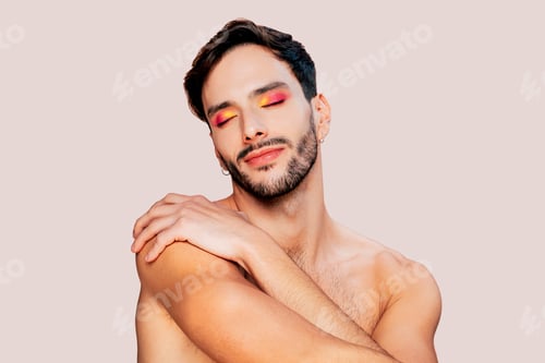 Preview: Beauty portrait of gay man without clothes with eyeshadow at studio