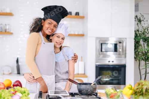 Preview: couple woman lover LGBT friend living with love care cooking at home holiday activity together