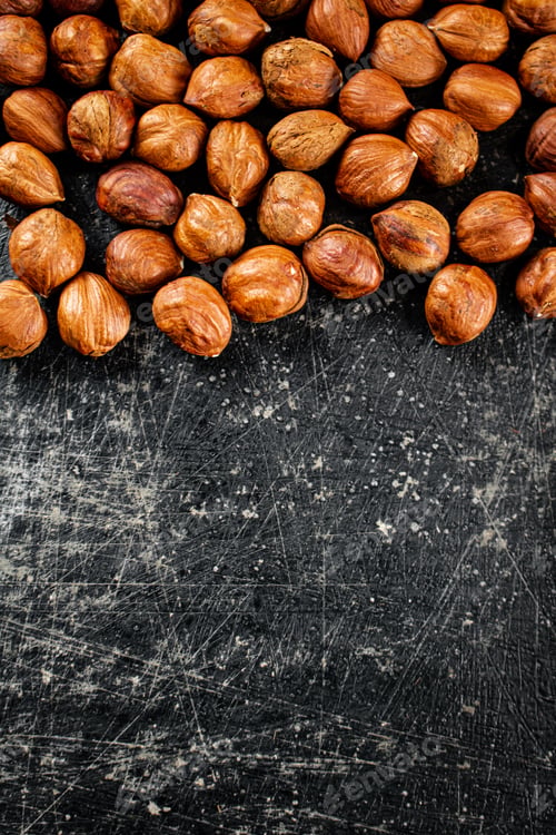 Preview: Peeled hazelnuts on the table.