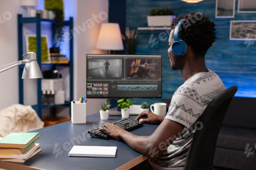 Preview: African american editor retouching video montage editing visual effects for movie