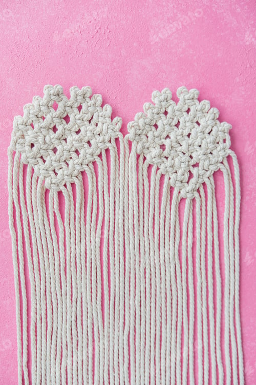 Preview: Double macrame heart panels in progress on pink background