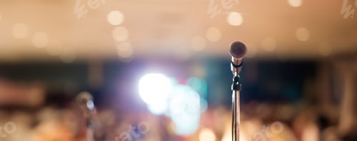 Preview: Microphone in concert hall or conference room soft and blur style for background.