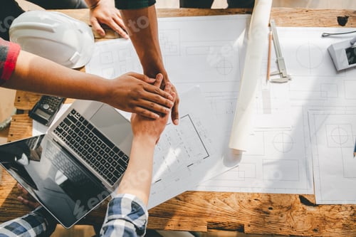 Preview: engineering team shaking hands start planning for architecture Engineer sketching construction proje