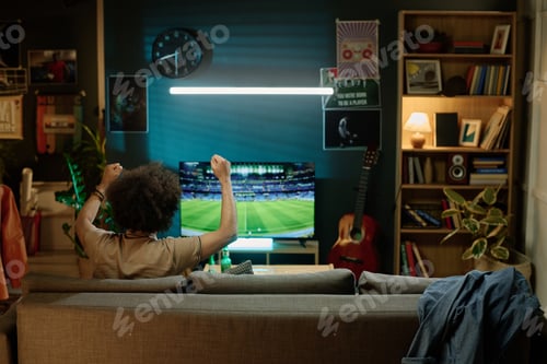 Preview: Unrecognizable Man Watching Sports Event