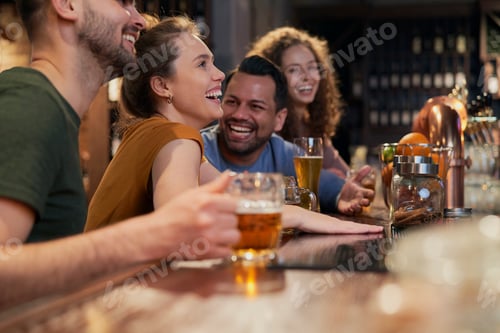 Preview: Caucasian group of friends have fun in the bar