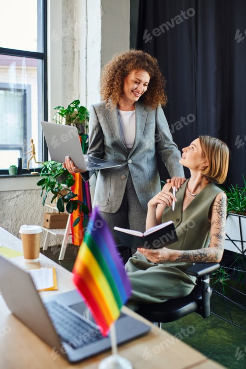 Preview: Coworkers share ideas in a vibrant office embracing diversity and inclusion