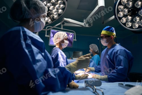 Preview: Surgical Team Performing Operation in Operating Room