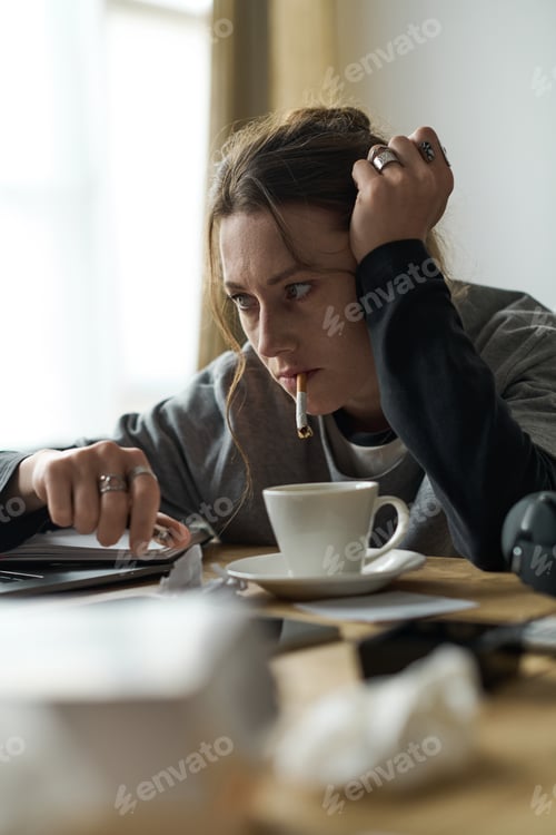 Preview: Young woman struggles with feelings of sadness at home while trying to find solace in coffee