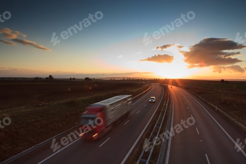 Preview: highway traffic - motion blurred truck on a highway/motorway/spe