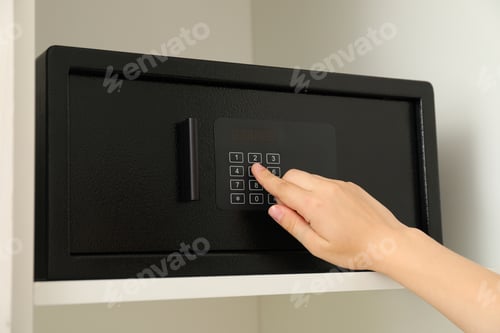 Preview: Black safe on shelves in the apartment