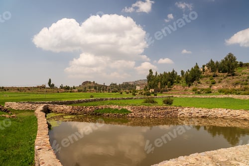 Preview: Scenic view of a lake surrounded by greenery in Ibb city, Yemen
