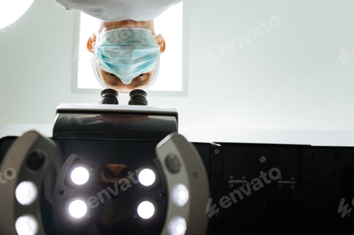 Preview: Low angle of a skilled male doctor at work