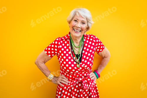 Preview: Happy grandmother posing on colored backgrounds