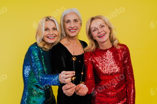 Preview: Happy senior women having party