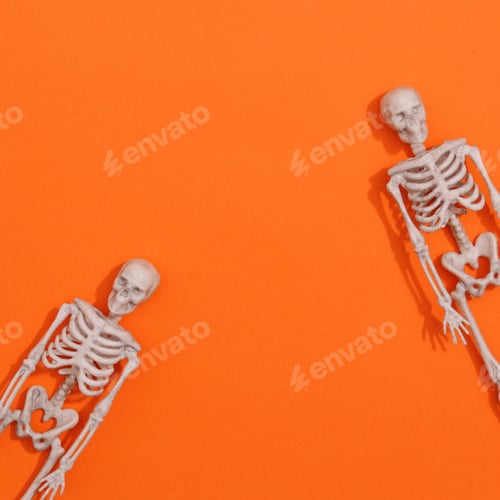 Preview: Skeletons on orange background. halloween concept. Copy space