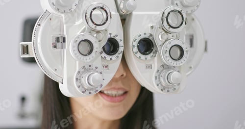 Preview: Woman having eye test