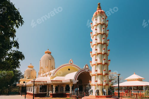 Preview: Mapusa, Goa, India. Lamp Tower And Temple Of The Shree Ganesh Mandir, Ganeshpuri. Famous Landmark