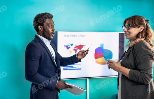 Preview: Multiracial people presenting business analytics reports in modern office - Entrepreneurship concept