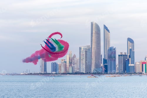 Preview: Aerobatic team doing stunts in the sky in Abu Dhabi, UAE as part of National Day celebrations