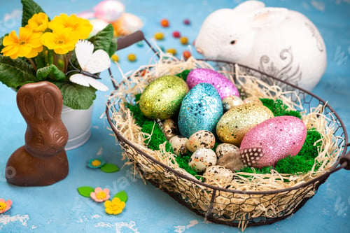 Preview: Spring Easter background for holiday. Easter composition with colorful Easter eggs on moss